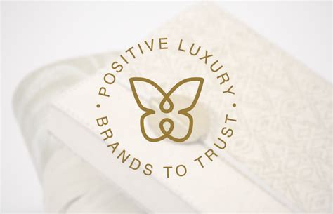 positive luxury butterfly mark